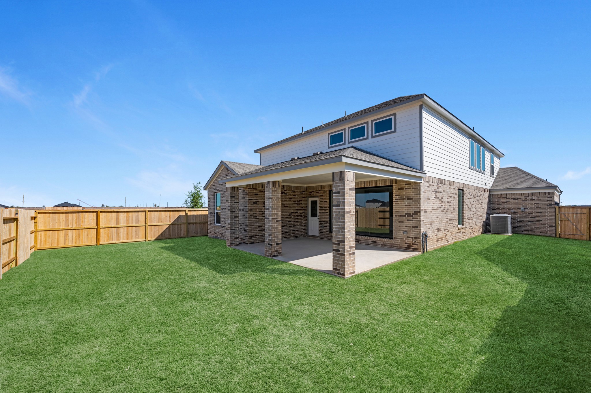 2129 Sunflower View Street Brookshire, TX 77423 - Photo 27 of 29 a view of a house with a yard and sitting area