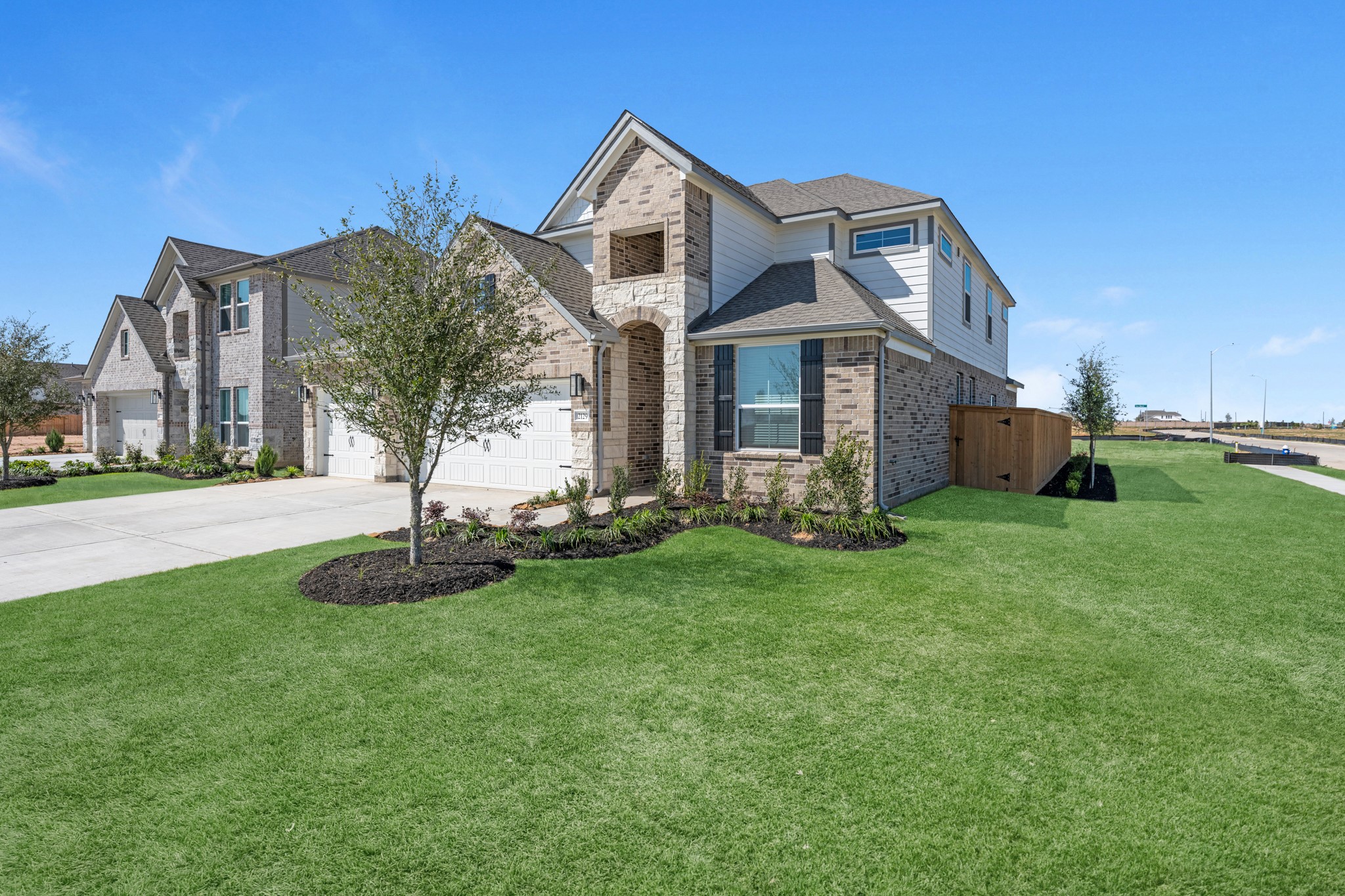 2129 Sunflower View Street Brookshire, TX 77423 - Photo 28 of 29 a front view of house with yard and green space