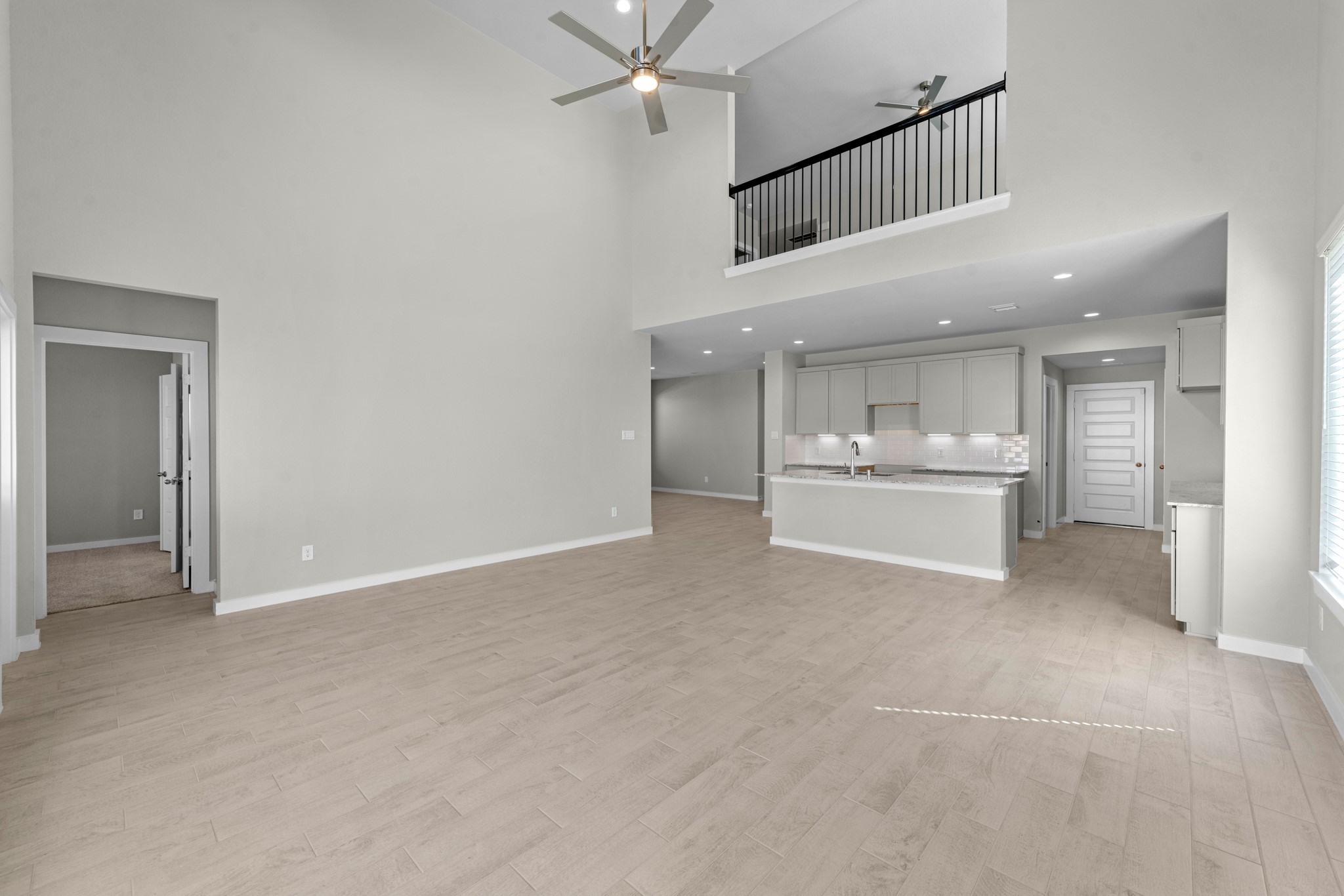 2129 Sunflower View Street Brookshire, TX 77423 - Photo 9 of 29 a view of a hallway with a kitchen