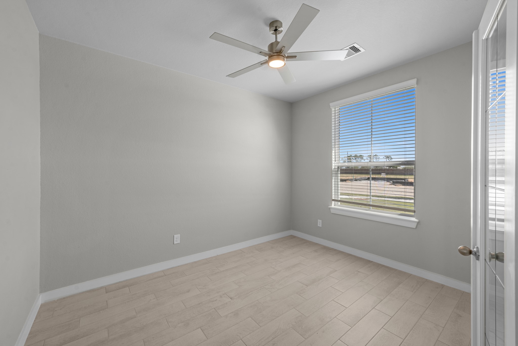 2129 Sunflower View Street Brookshire, TX 77423 - Photo 10 of 29 a view of an empty room with a window
