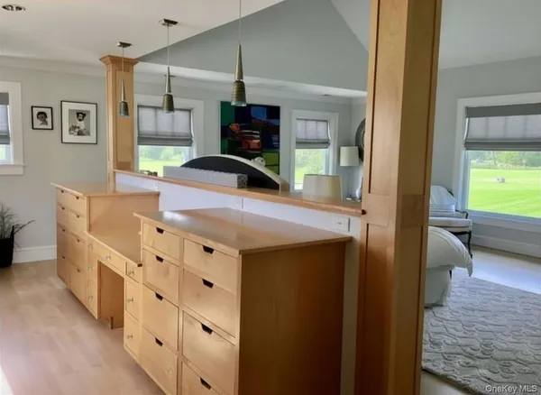 a kitchen with stainless steel appliances a sink and a refrigerator