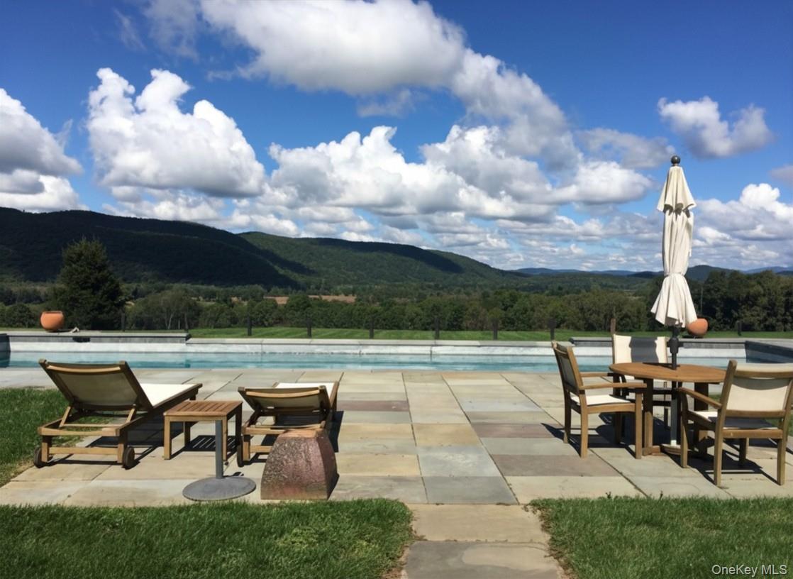 162 Amenia Union Road Amenia, NY 12501 - Photo 2 of 16 Set on 104 Completely Private Acres with 360 Degree Views & an Infinity-Edge Pool Worthy of a 5-star Resort