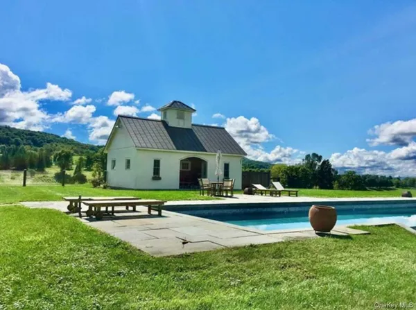 a view of a house with a back yard