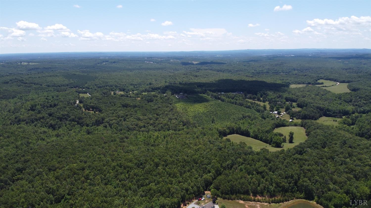 0 Chapel Grove Road Evington, VA 24550 - Photo 4 of 4 a view of a city with lush green forest