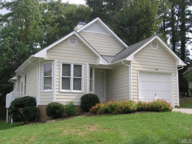108 Tall Rock Court Raleigh, NC 27610 - Photo 1 of 1 a front view of a house with a yard and garage
