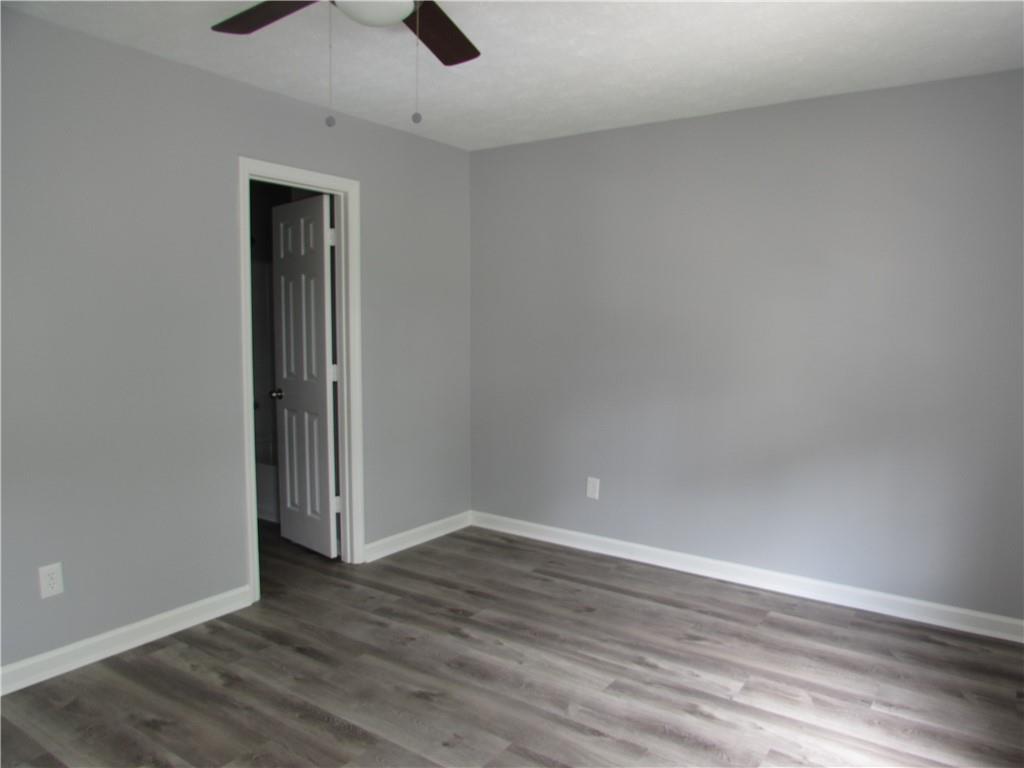 835 Heritage Valley Road Norcross, GA 30093 - Photo 23 of 34 wooden floor in an empty room