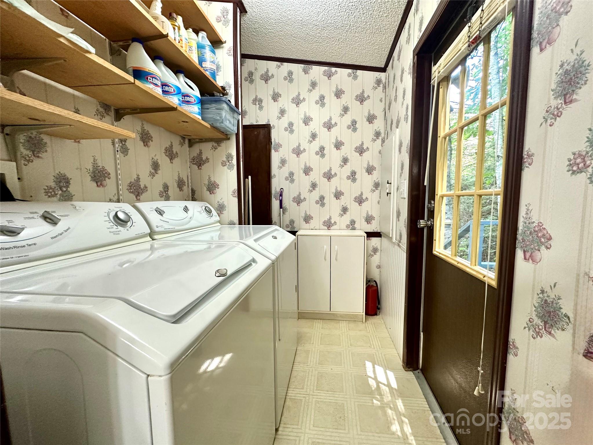 572 Blue Rdg Parkway Spruce Pine, NC 28777 - Photo 18 of 38 a utility room with dryer and washer