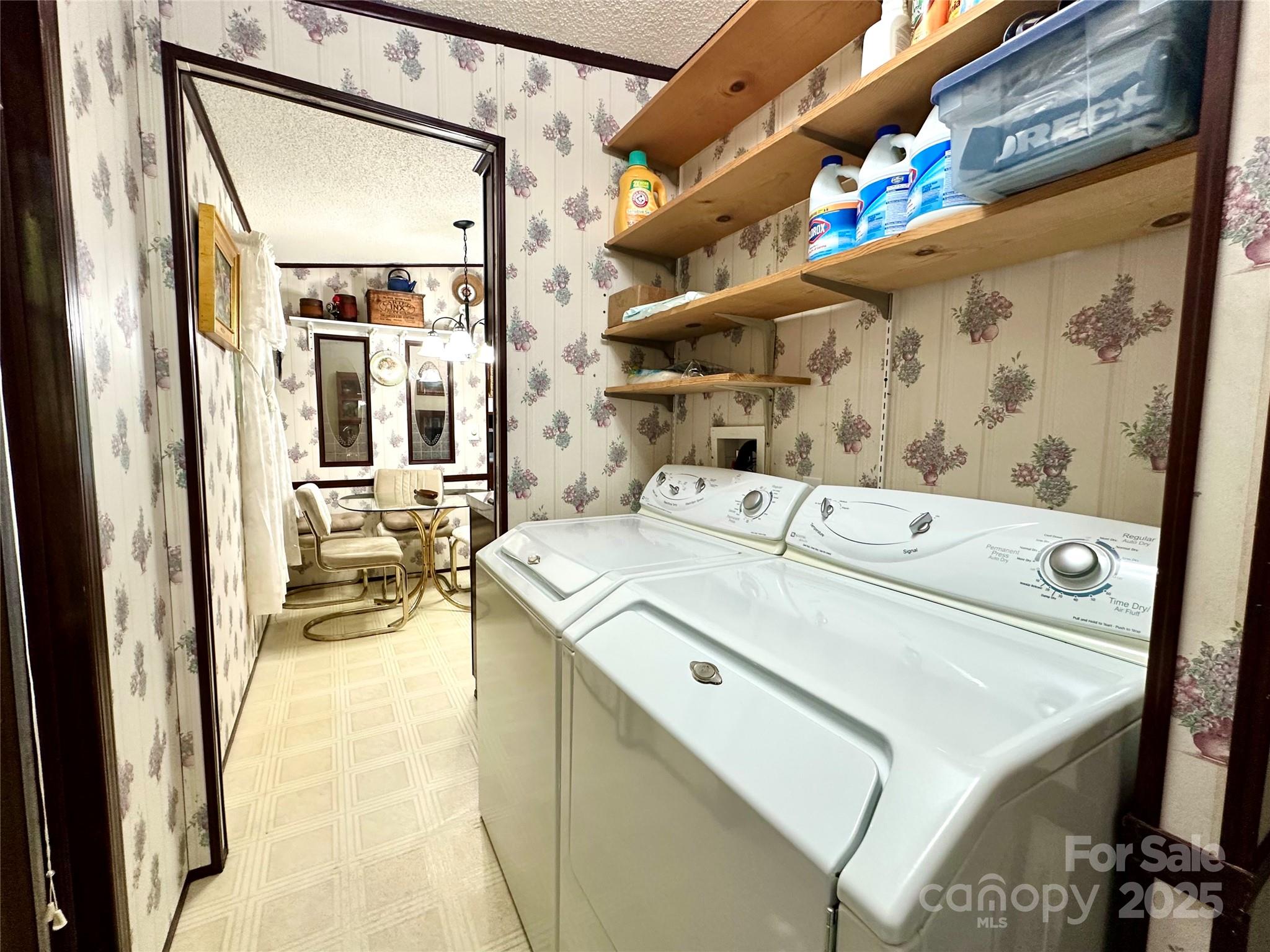 572 Blue Rdg Parkway Spruce Pine, NC 28777 - Photo 19 of 38 a utility room with dryer and washer