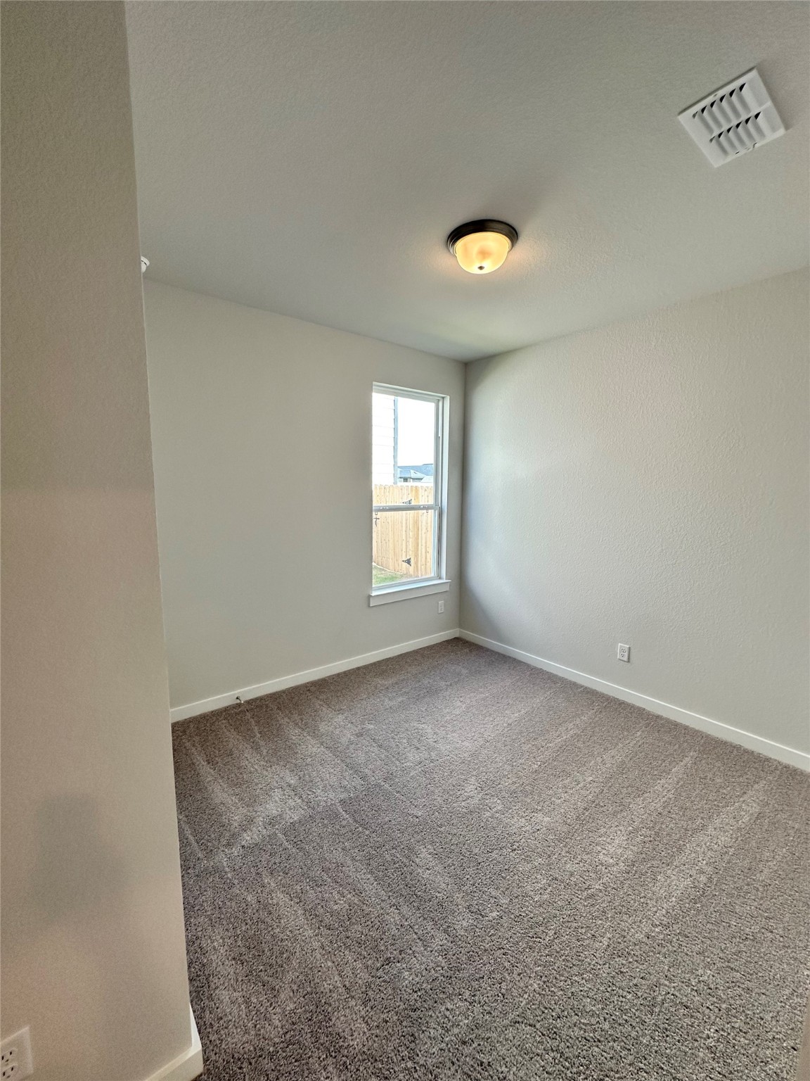 21619 Flannel Bush Lane Cypress, TX 77433 - Photo 12 of 34 an empty room with a window