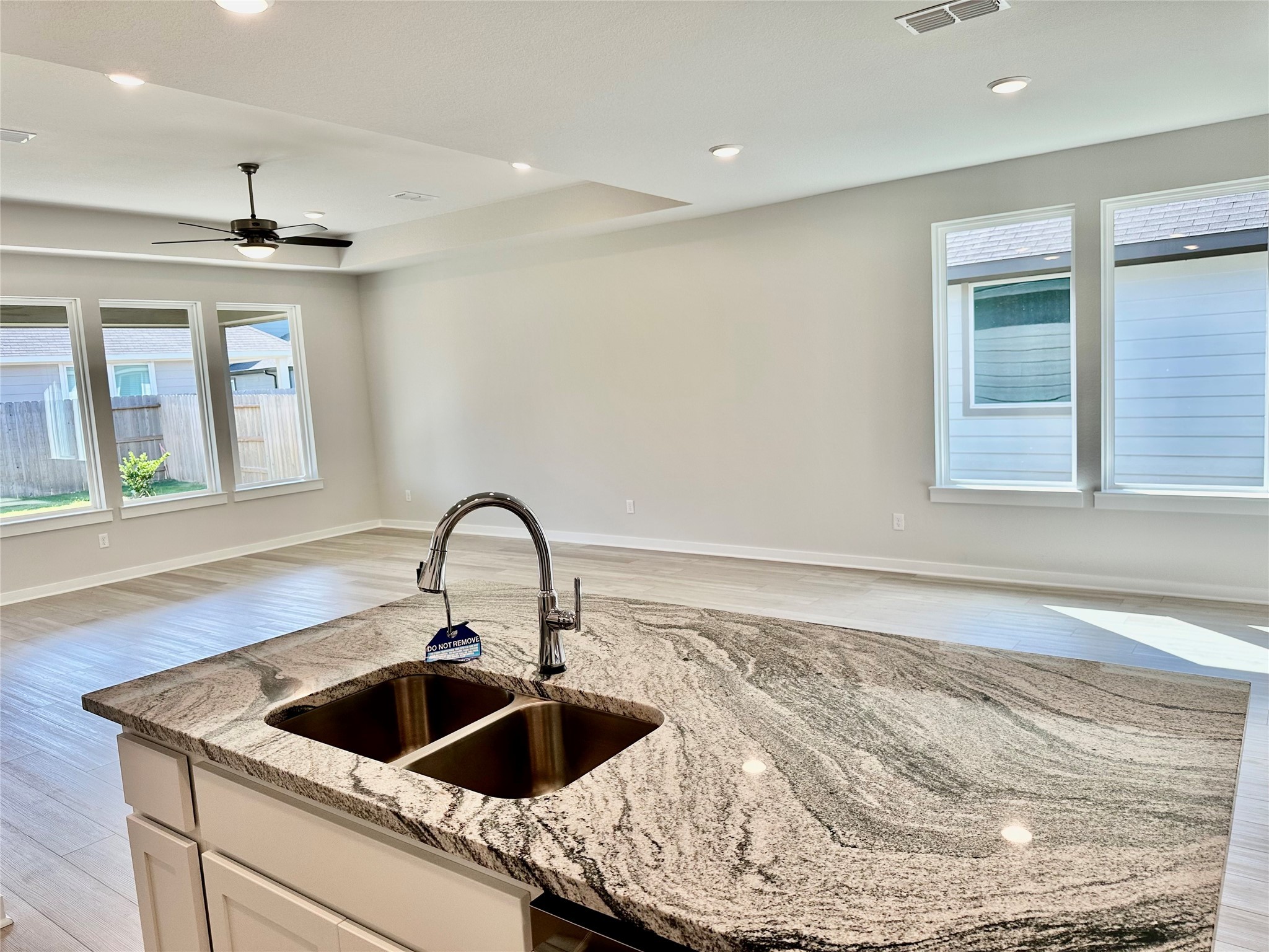 21619 Flannel Bush Lane Cypress, TX 77433 - Photo 18 of 34 a kitchen with a sink and a stove top oven