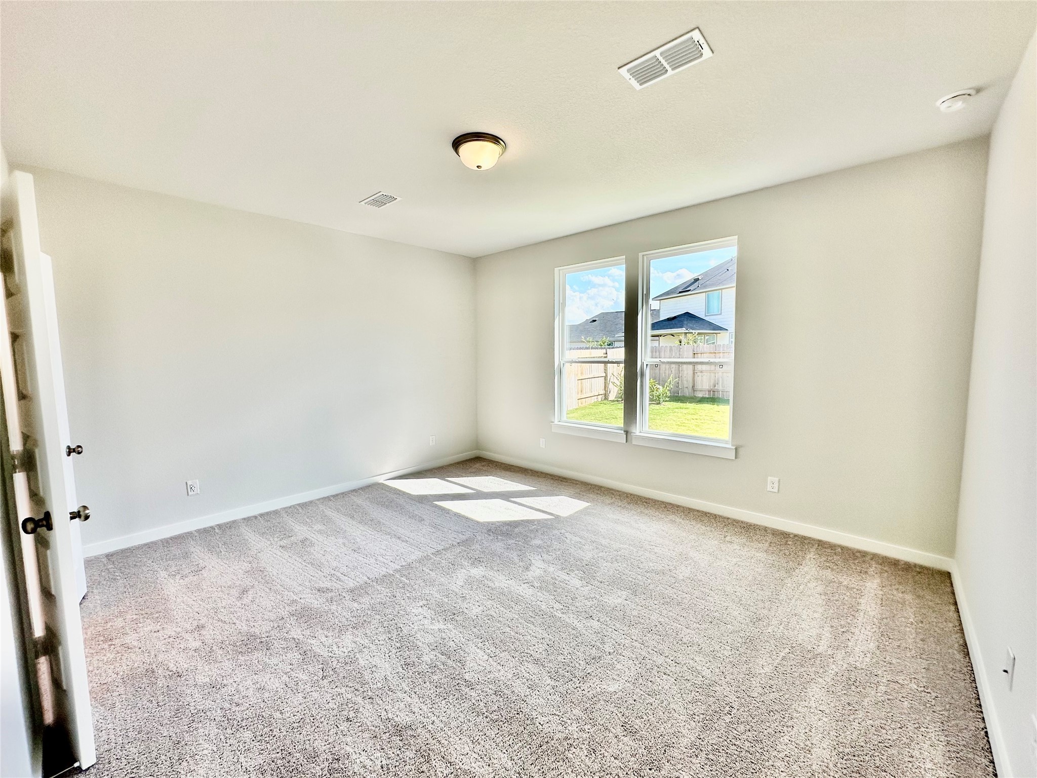 21619 Flannel Bush Lane Cypress, TX 77433 - Photo 20 of 34 an empty room with windows