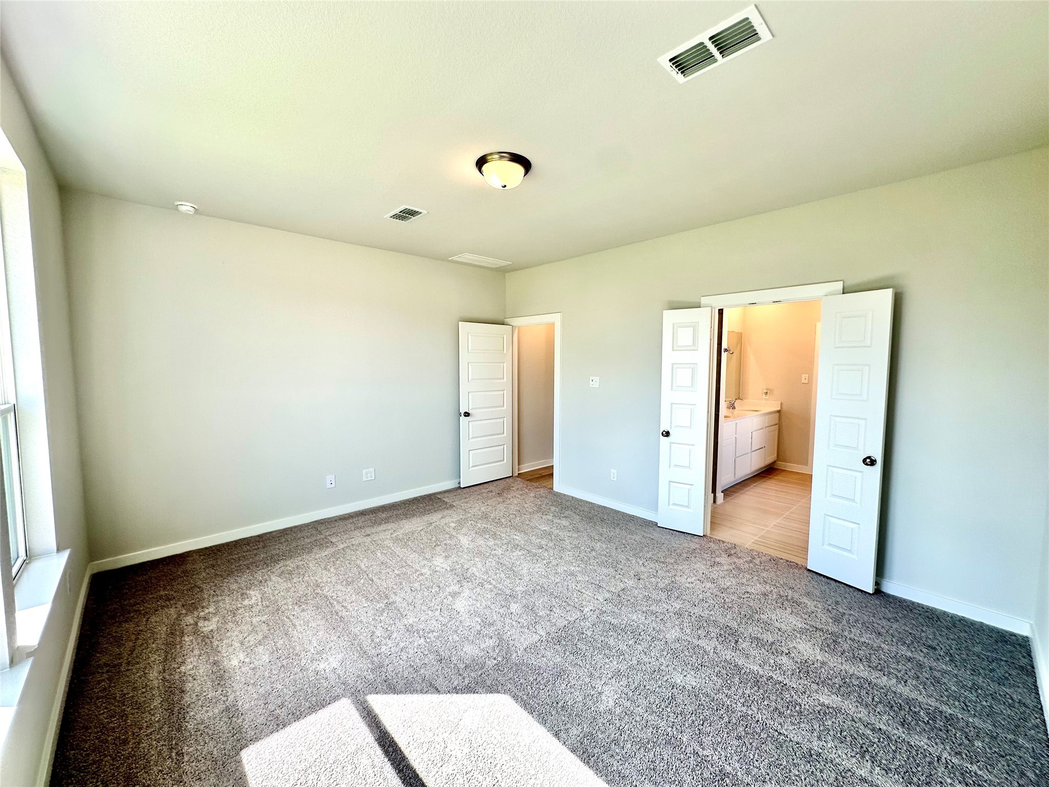 21619 Flannel Bush Lane Cypress, TX 77433 - Photo 21 of 34 wooden floor in an empty room with a window