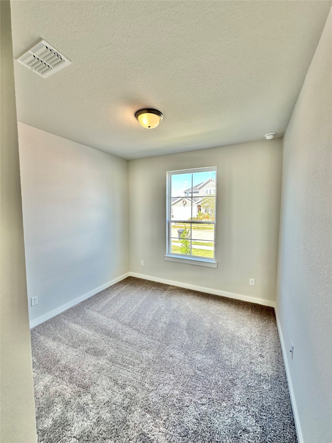 21619 Flannel Bush Lane Cypress, TX 77433 - Photo 5 of 34 an empty room with a window