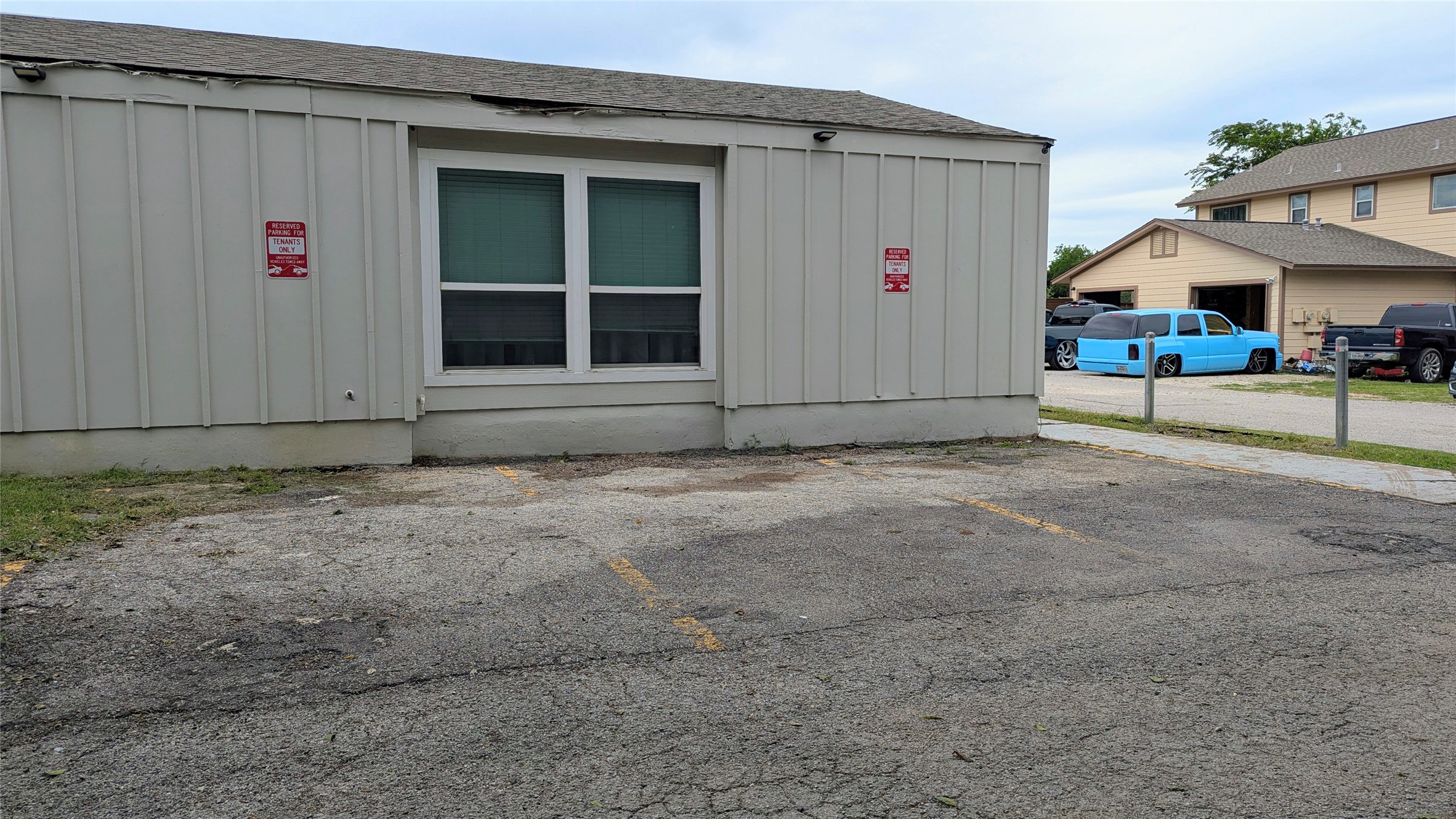 4505 Teri Road, Unit A Austin, TX 78744 - Photo 22 of 23 Secure parking is readily available for residents, ensuring convenient access to this property.