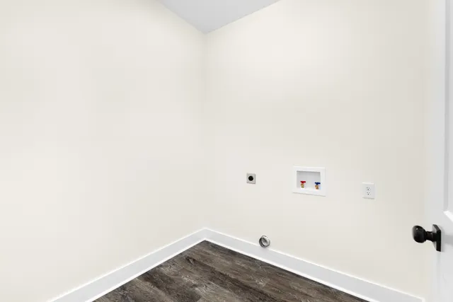 a view of a livingroom with natural light