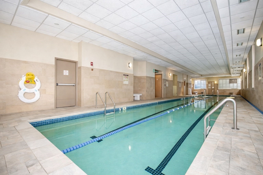 8-12 Museum Way, Unit 828 Cambridge, MA 02141 - Photo 13 of 13 a bathroom with a sink and mirror