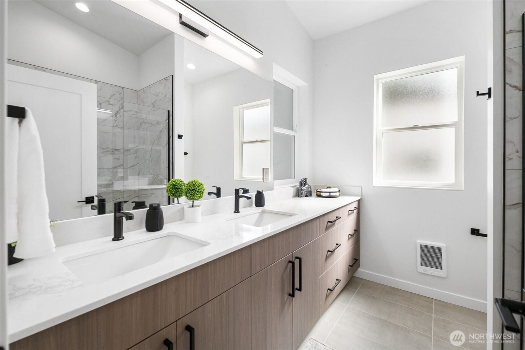 2809 South Grand Street Seattle, WA 98144 - Photo 15 of 28 a bathroom with a double vanity sink mirror and double