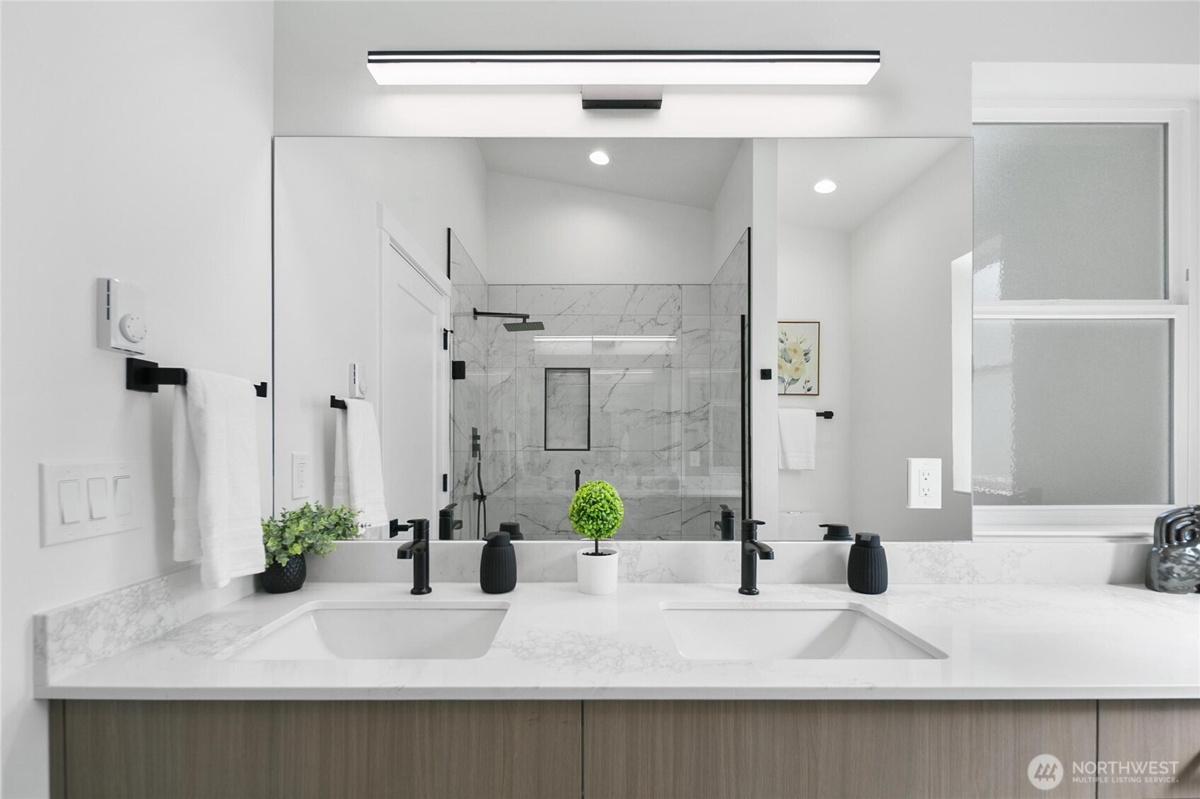2809 South Grand Street Seattle, WA 98144 - Photo 16 of 28 a bathroom with a sink and a mirror