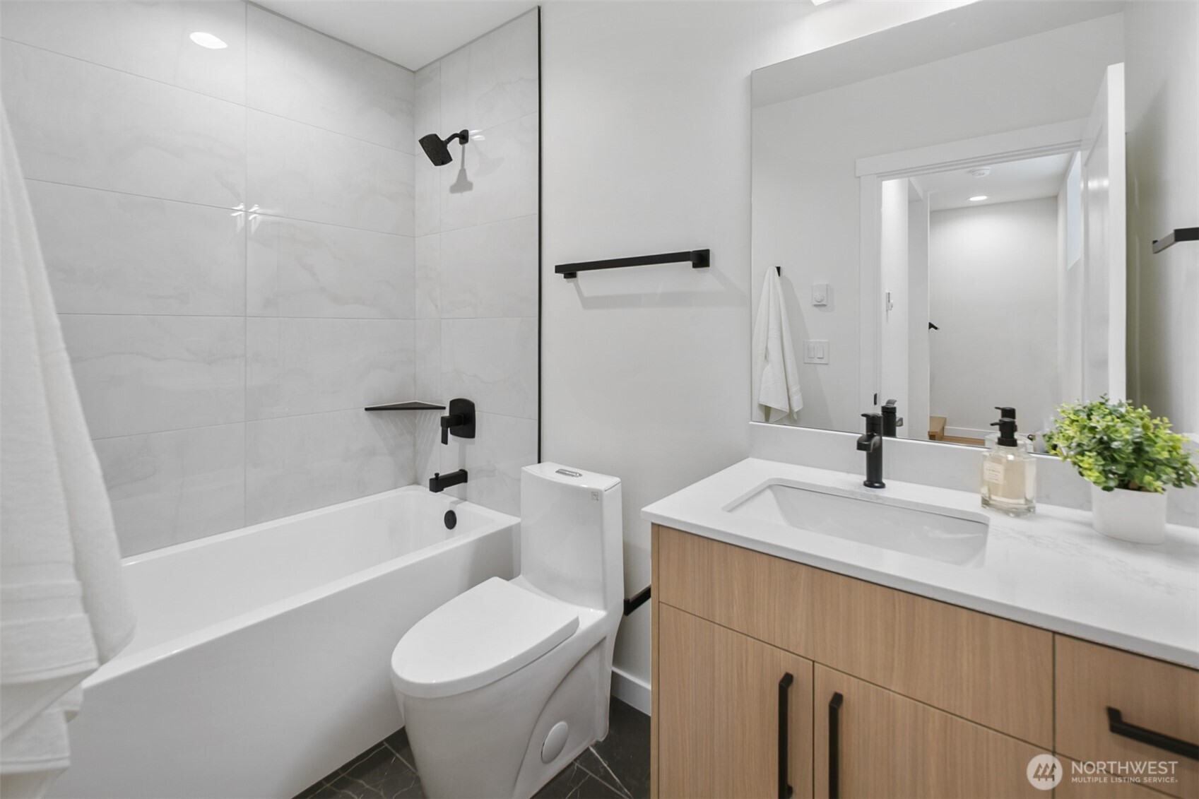 2809 South Grand Street Seattle, WA 98144 - Photo 19 of 28 a bathroom with a sink toilet and shower
