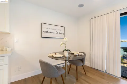 a view of a table and chairs in a room