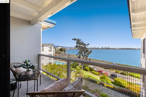 a view of swimming pool with seating area