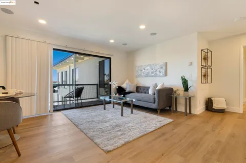 a living room with furniture and a table