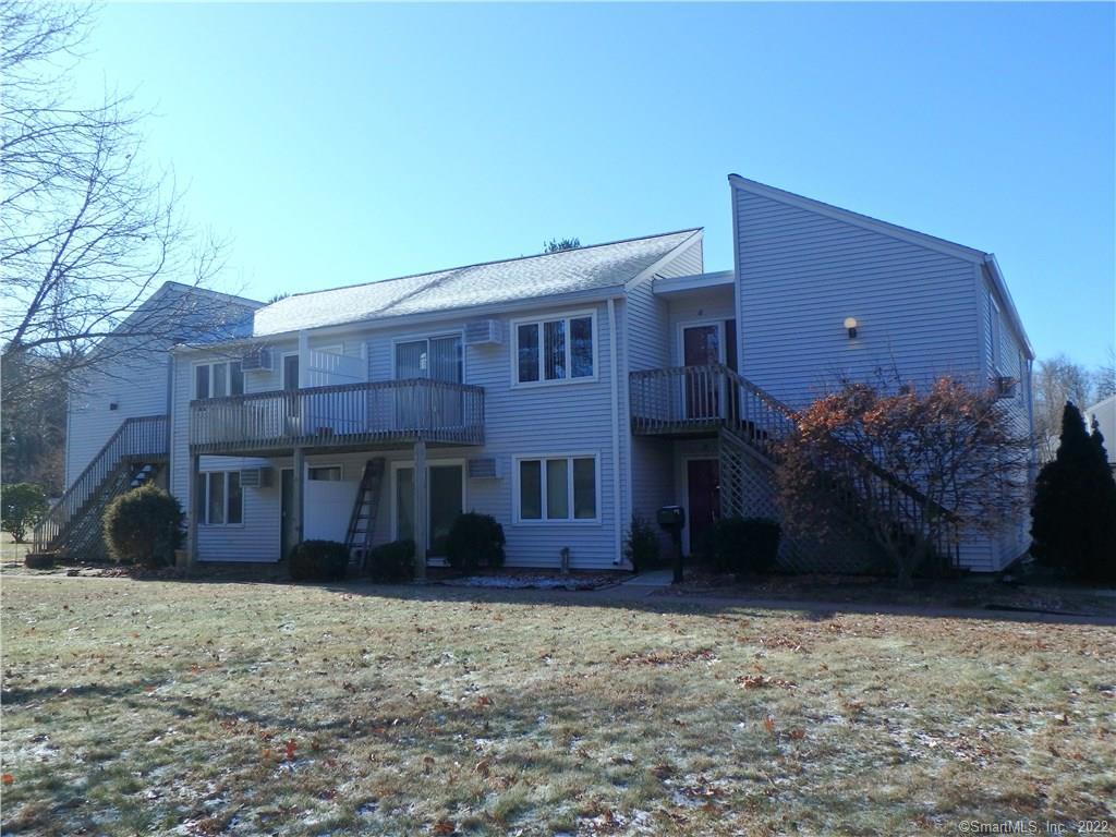 85 Old Town Road, Unit 6 Vernon, CT 06066 - Photo 1 of 1 a view of a house with a yard
