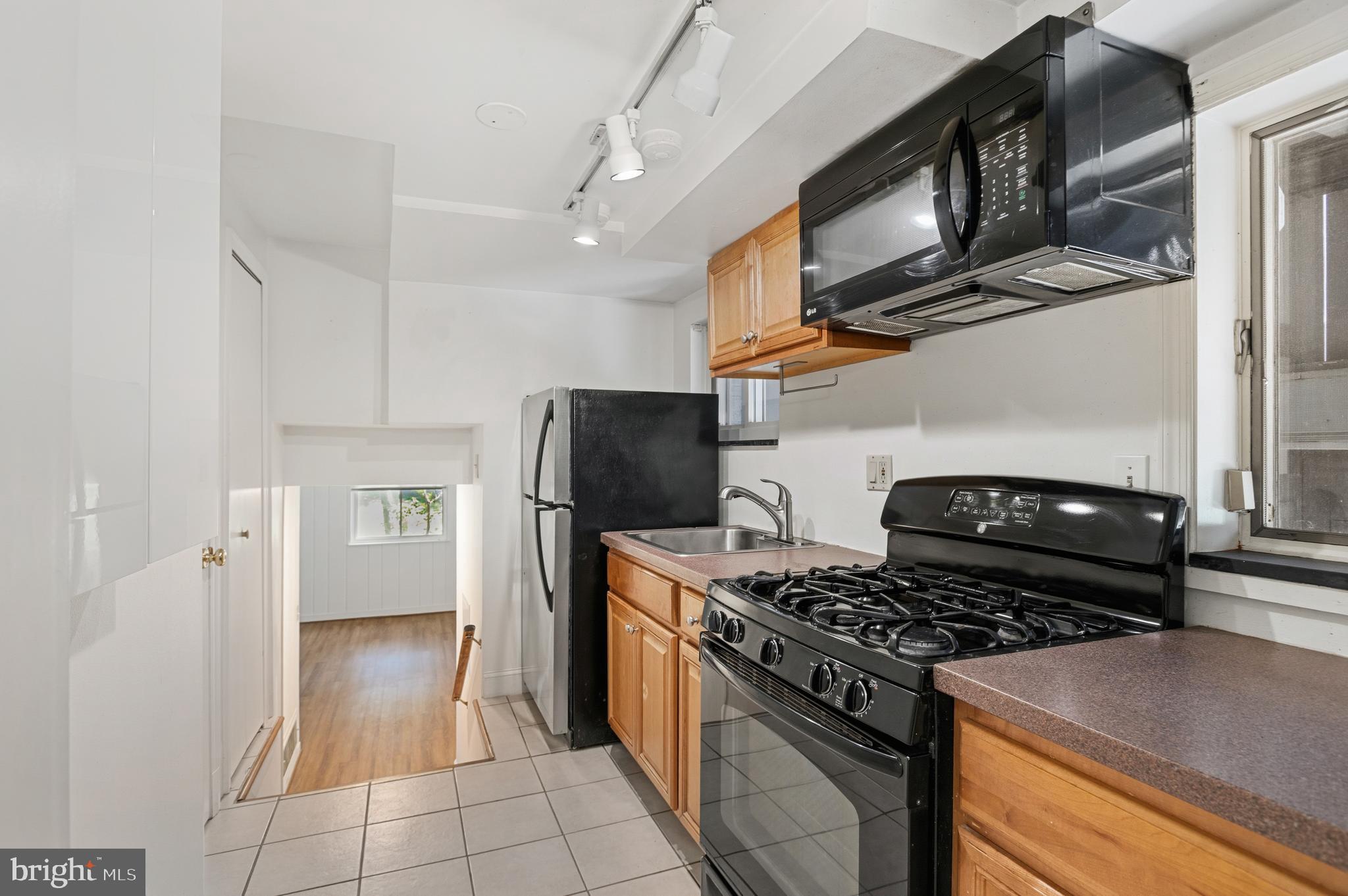 5523 Uppingham Street Chevy Chase, MD 20815 - Photo 22 of 31 Lower Level Kitchen
