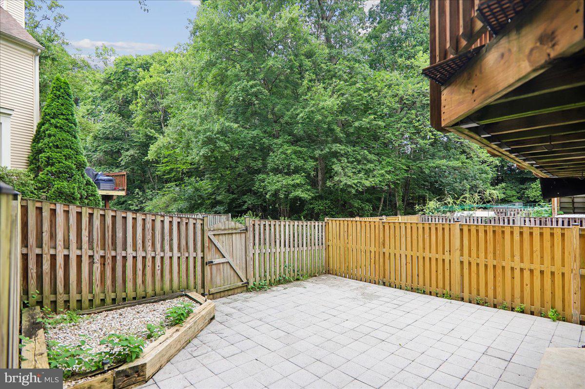 7408 Spring Tree Drive Springfield, VA 22153 - Photo 36 of 48 Serene backyard retreat in nature.