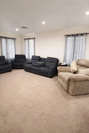 a living room with furniture and a couch