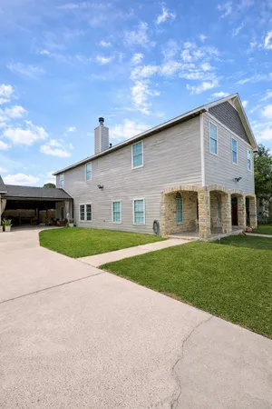a view of a yard in front of a house