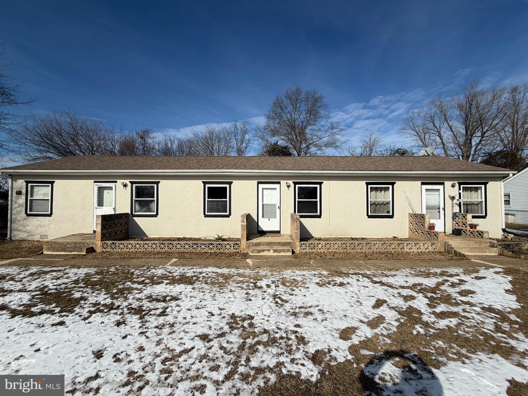 front view of a house with a patio