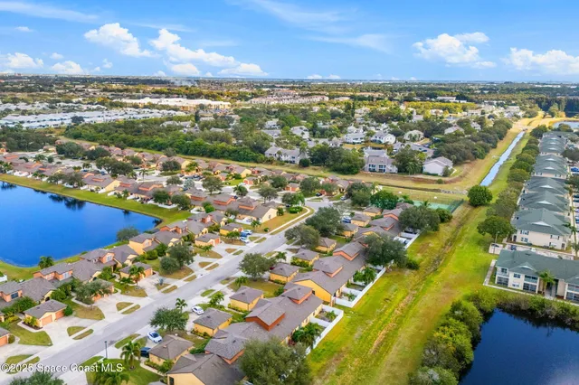 a view of a city with an ocean
