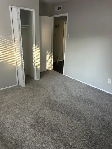 an empty room with windows