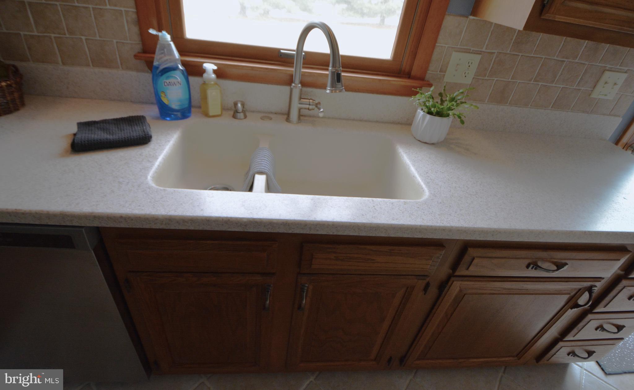 1658 Sams Creek Road Westminster, MD 21157 - Photo 11 of 59 a close view of sink and tap
