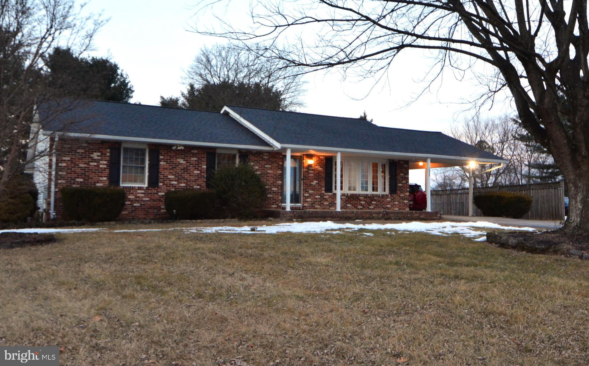 1658 Sams Creek Road Westminster, MD 21157 - Photo 34 of 59 a front view of a house with a garden