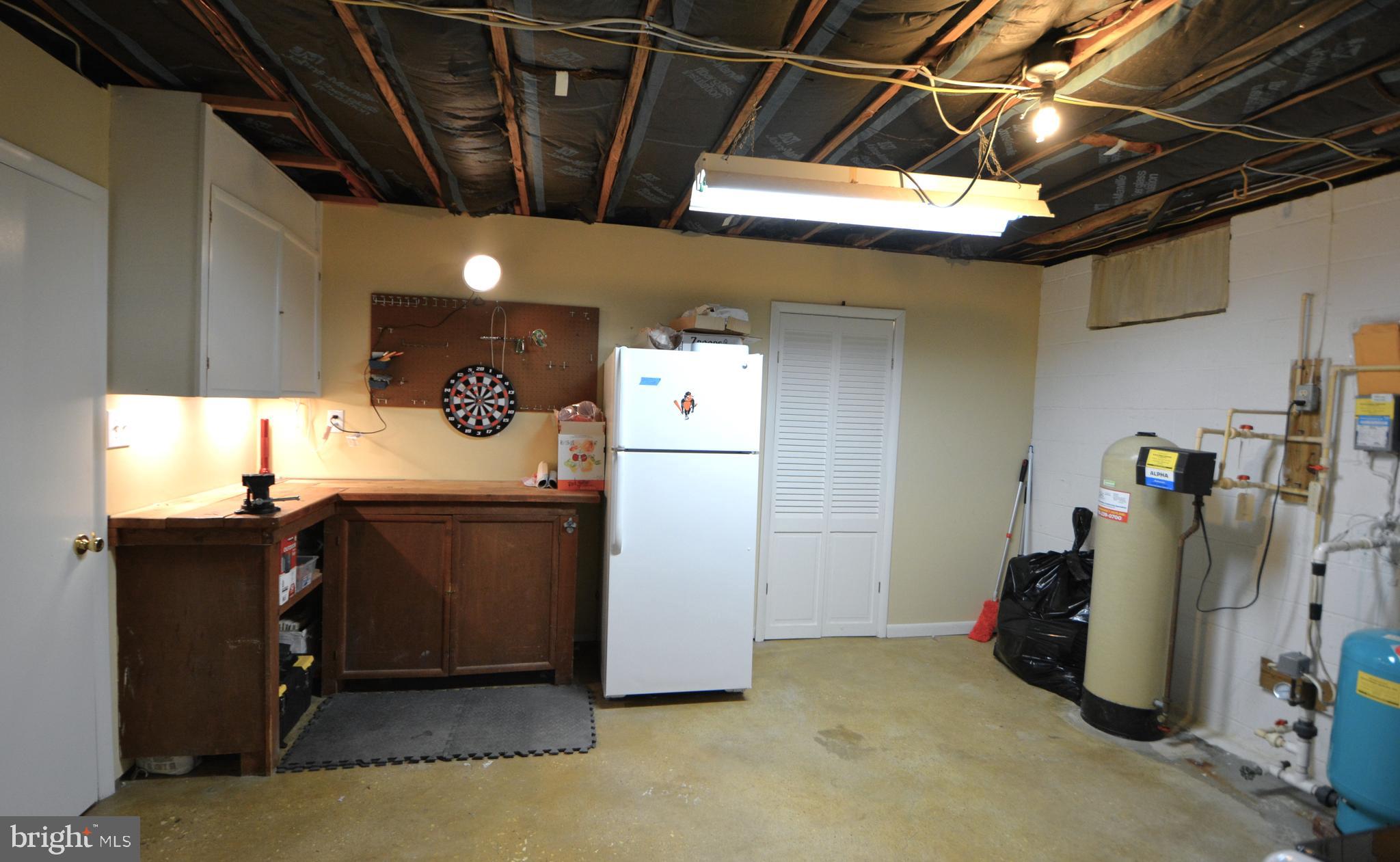 1658 Sams Creek Road Westminster, MD 21157 - Photo 51 of 59 Extra fridge, cabinet storage insulated ceiling!