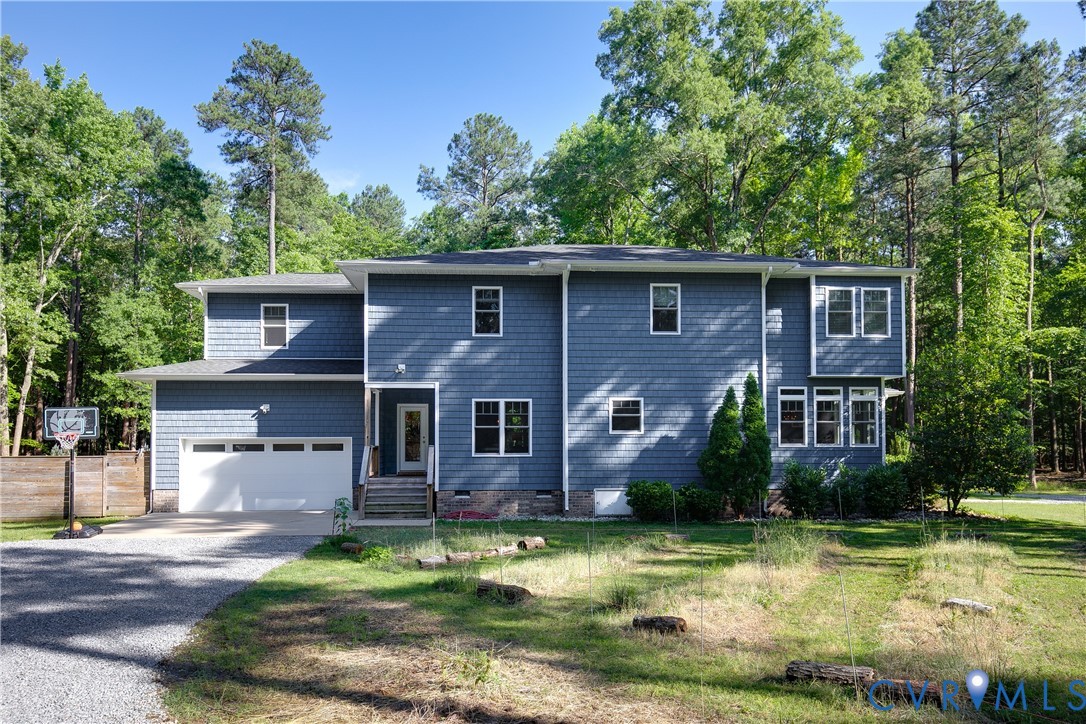 9749 Hoke Brady Road Henrico, VA 23231 - Photo 47 of 53 a front view of a house with garden