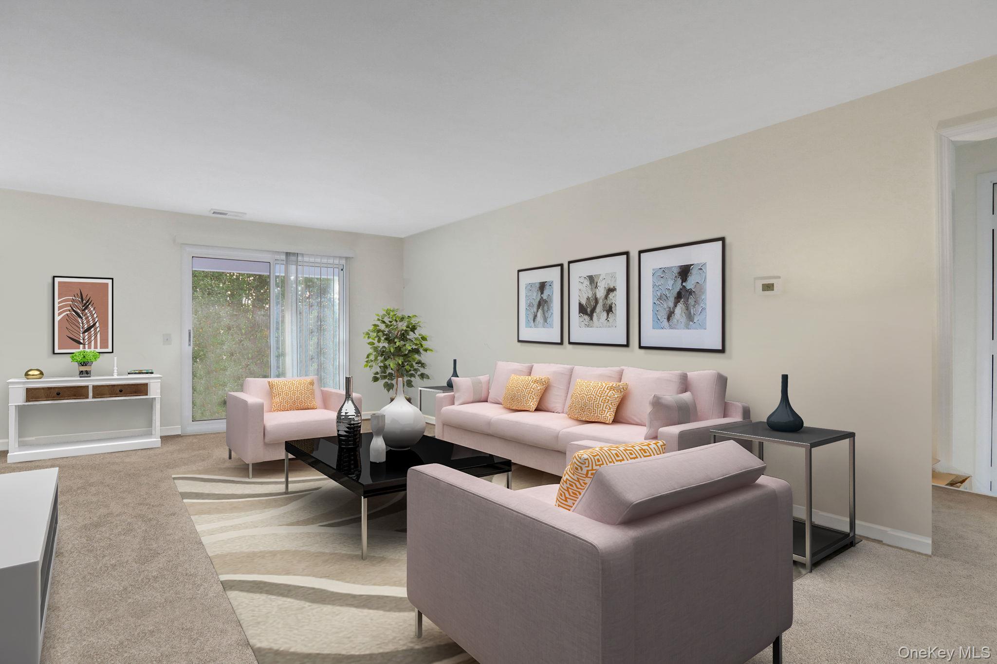 302 Commons Way, Unit E Fishkill, NY 12524 - Photo 9 of 26 Virtually staged. Living area featuring light colored carpet and baseboards