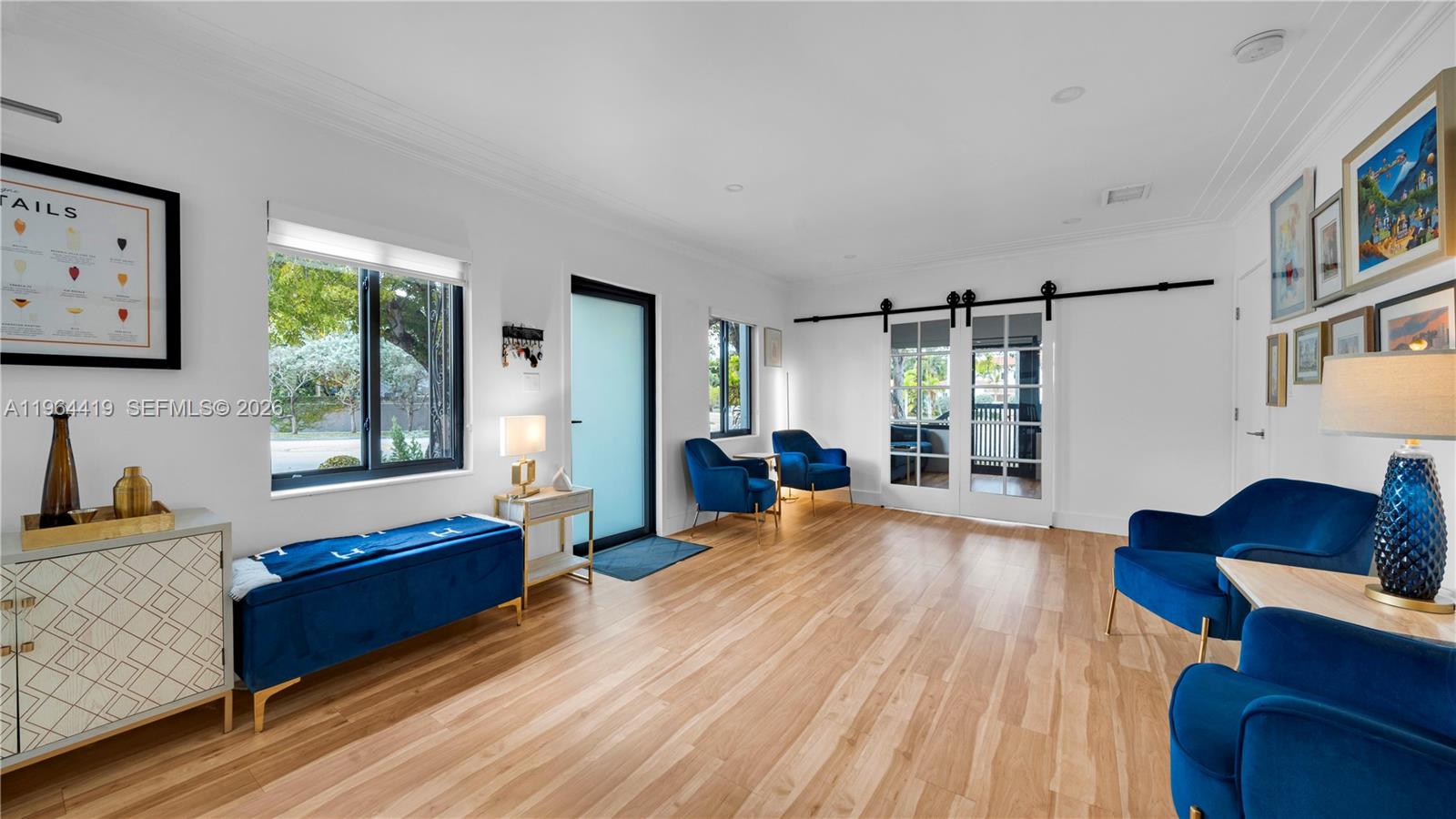375 Southwest 32nd Road Miami, FL 33129 - Photo 14 of 39 a living room with furniture and a window