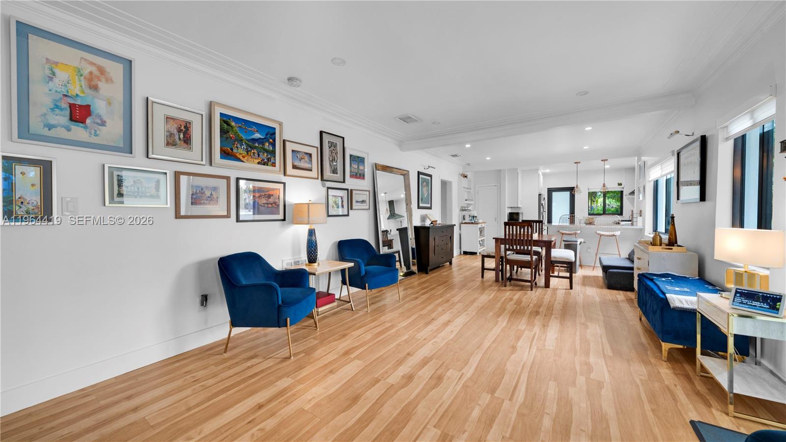 375 Southwest 32nd Road Miami, FL 33129 - Photo 15 of 39 a living room with furniture and a wooden floor