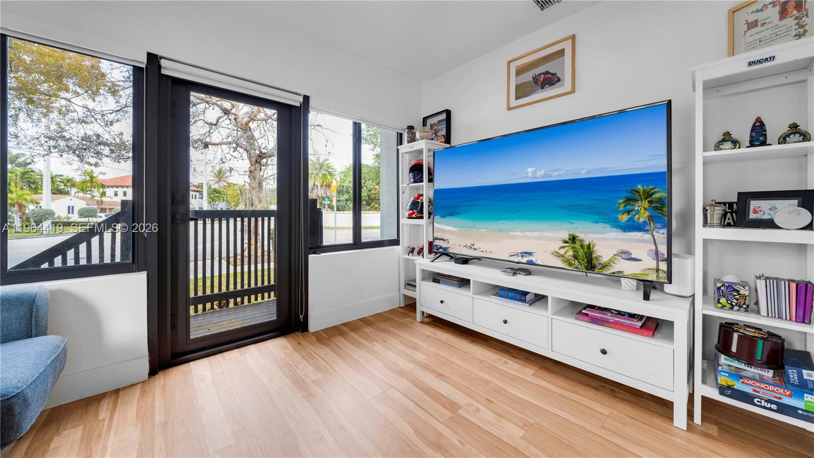 375 Southwest 32nd Road Miami, FL 33129 - Photo 17 of 39 a kitchen with stainless steel appliances granite countertop a stove and a large window