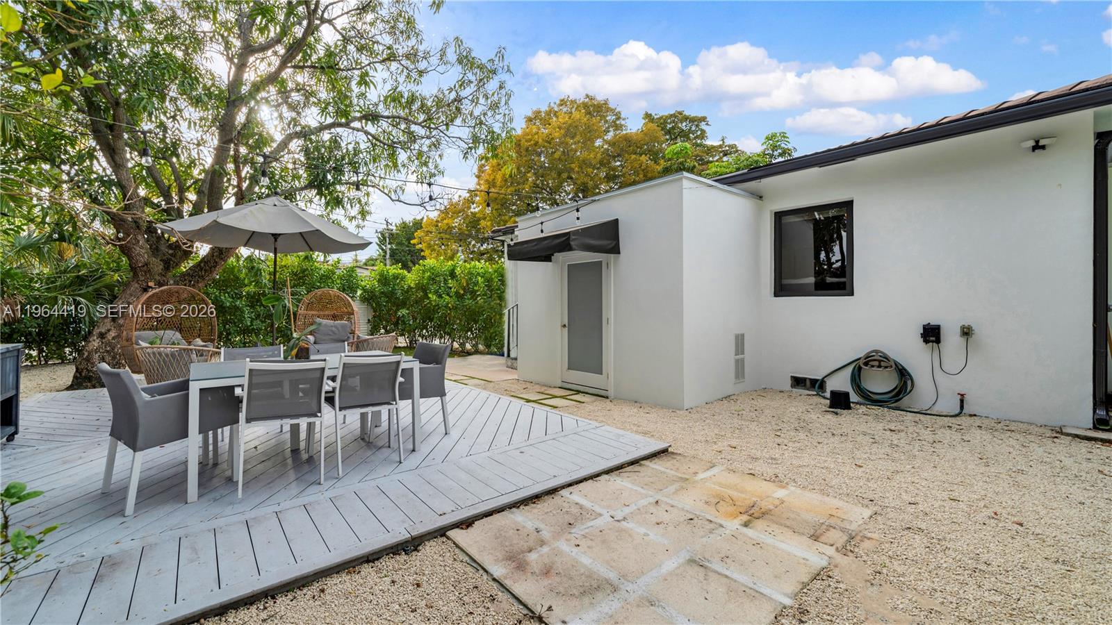 375 Southwest 32nd Road Miami, FL 33129 - Photo 32 of 39 a view of house with patio outdoor seating