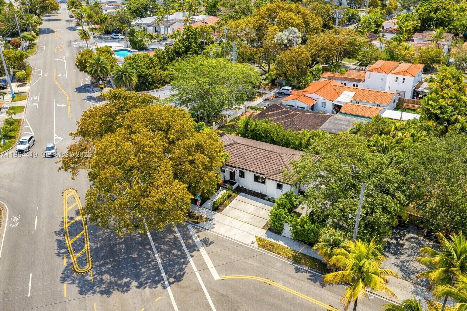 375 Southwest 32nd Road Miami, FL 33129 - Photo 35 of 39 an aerial view of a house with yard swimming pool and outdoor seating