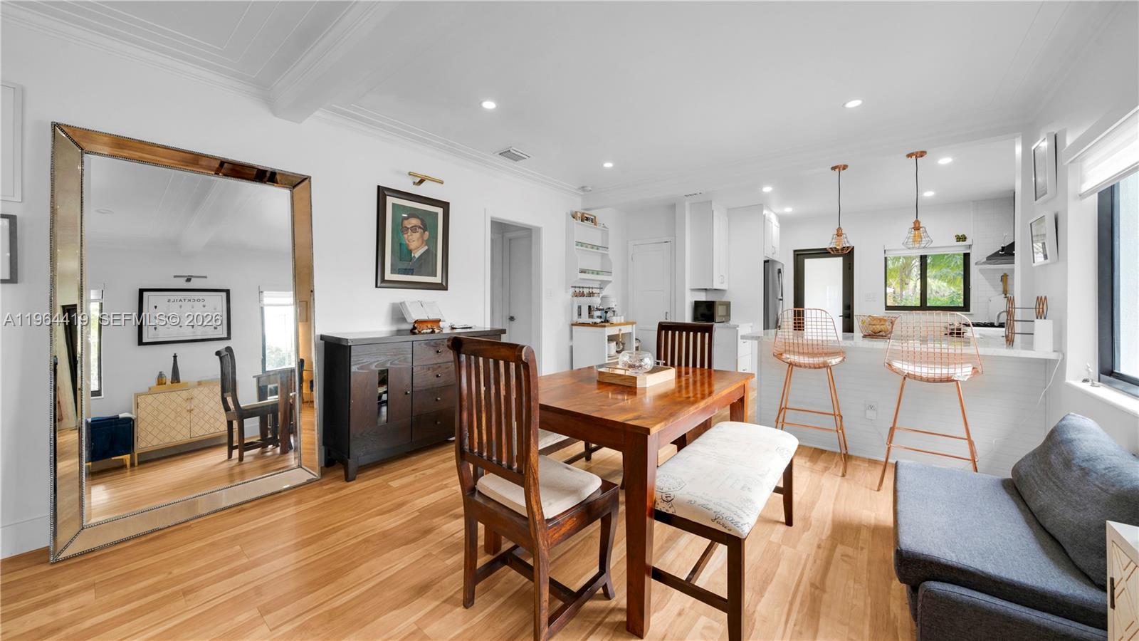 375 Southwest 32nd Road Miami, FL 33129 - Photo 8 of 39 a view of a dining room with furniture