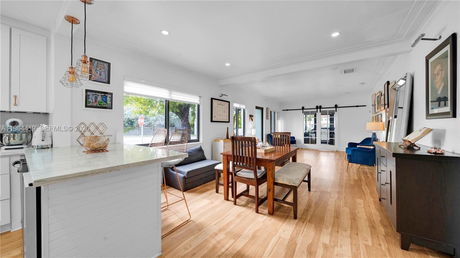 375 Southwest 32nd Road Miami, FL 33129 - Photo 9 of 39 a living room with furniture and a wooden floor