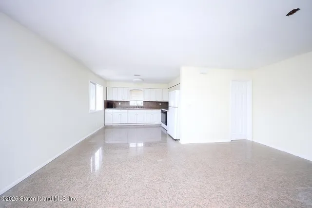 a view of a kitchen with a sink