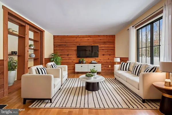 a kitchen with stainless steel appliances granite countertop a refrigerator a sink and dishwasher