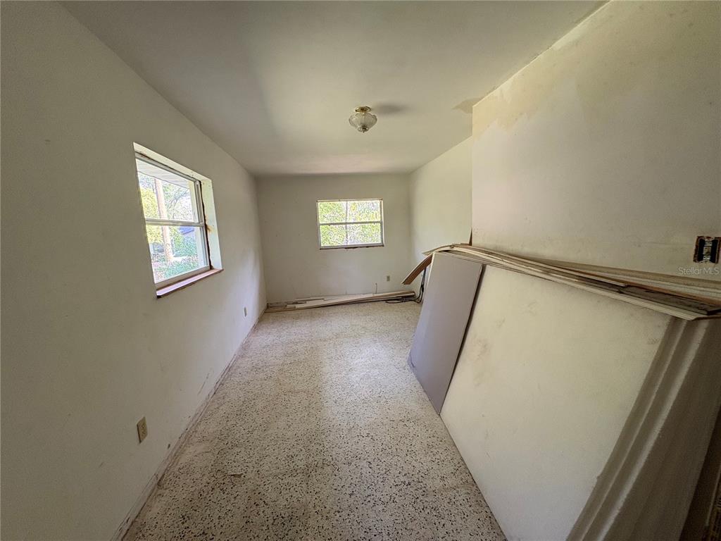 3922 South Apopka Avenue Inverness, FL 34452 - Photo 15 of 39 a view of a hallway with windows