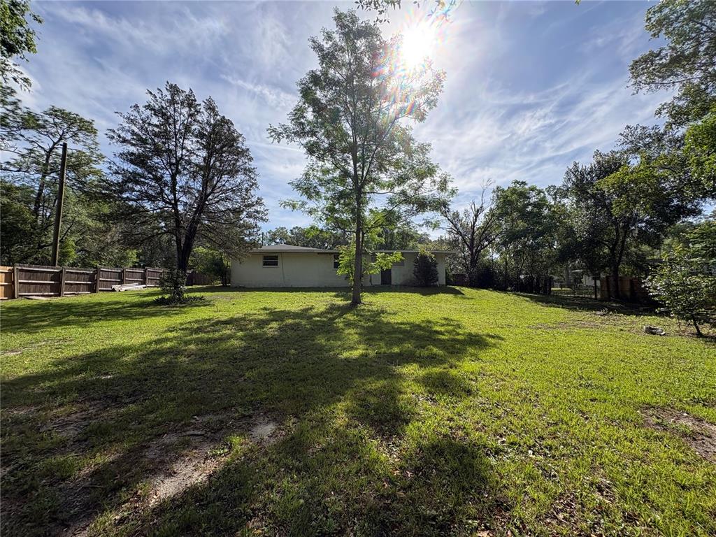 3922 South Apopka Avenue Inverness, FL 34452 - Photo 2 of 39 a view of a house with a yard